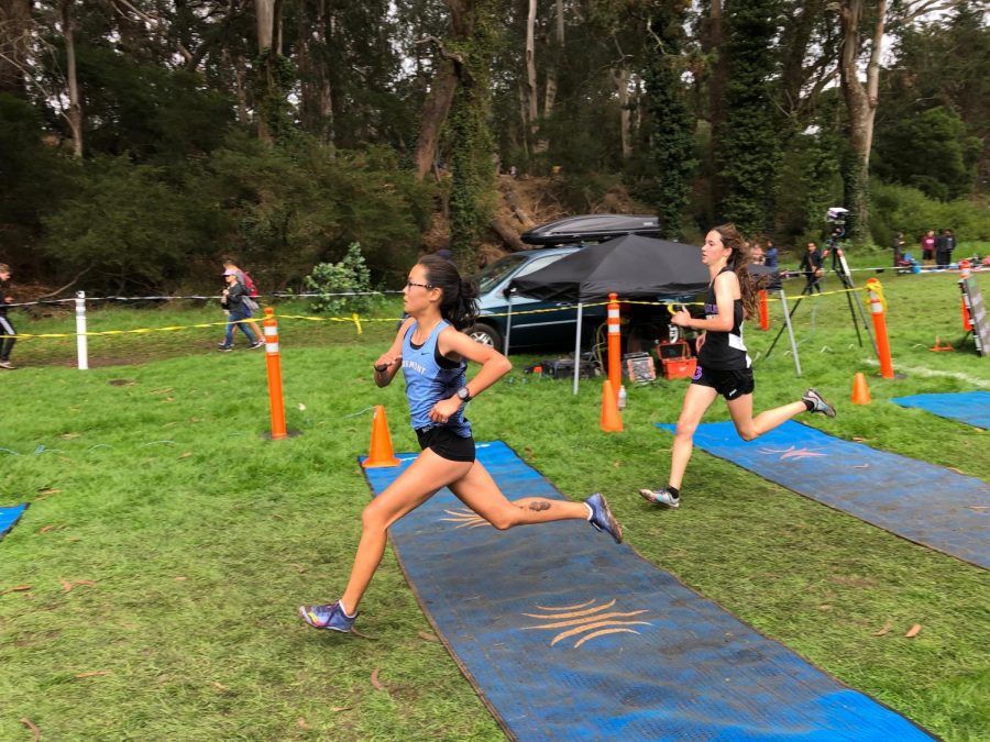 Twins Kadie and Elyse Kong both share a love of running, and are both on the Oakmont cross country team.