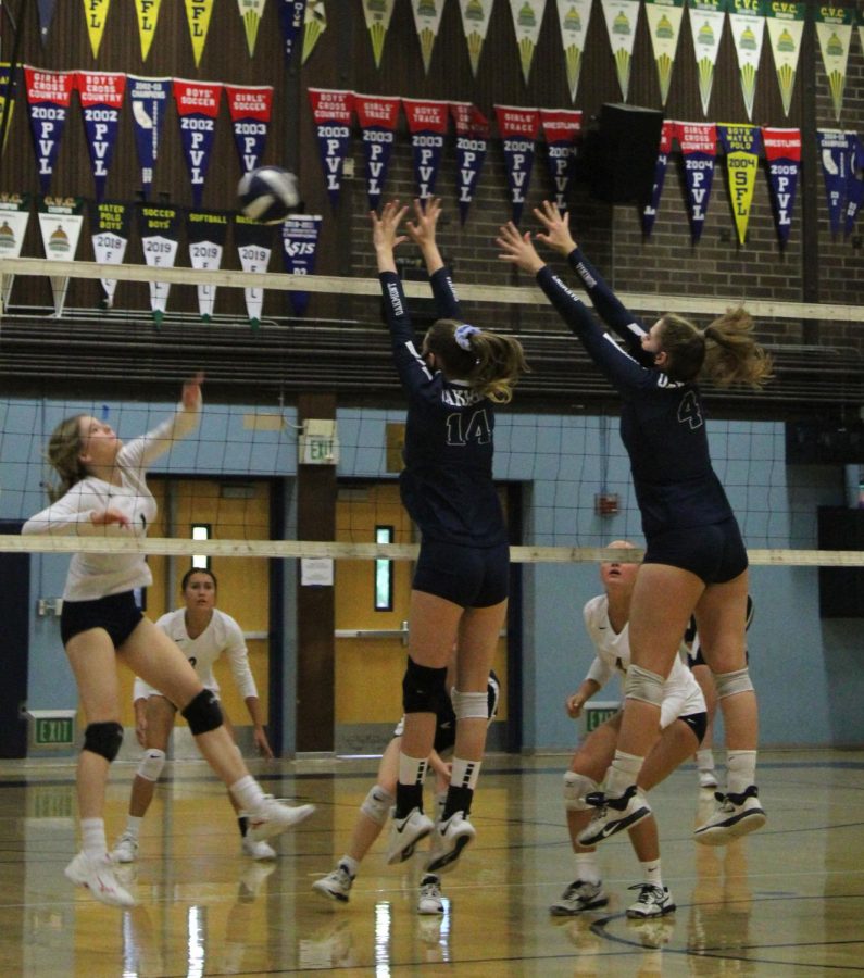 Ella Pock (4) and Chloe Kelly (14) secure a spectacular block against Vista.