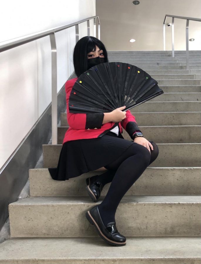 “I have been to a ton of conventions before, and SacAnime is one I usually attend,” Douglas said. “People kind of think I am a con expert.” 
Here, they are pictured cosplaying as Yumeko from “Kakegurui on Sunday, the third day of the convention. 
