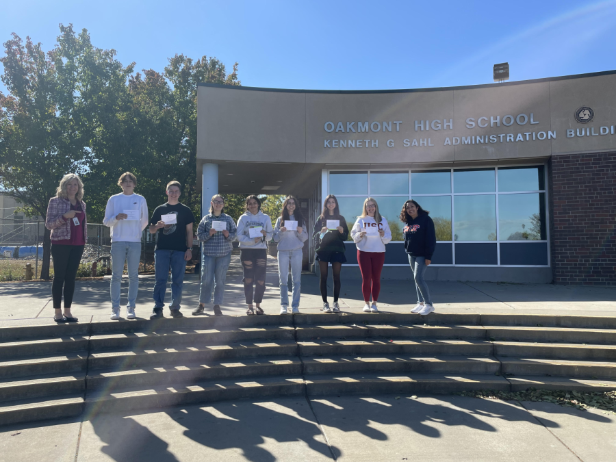 Ms. Jennifer Leighton (left), seven of the National Merit Commended Students (Remi Royer, Sam Carmon, Sophia Jenson, Neha Nepal, Isabella Estrada, Valentina Moreno, Jolie Anderson) and Dr. Govea (right)
