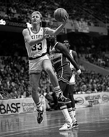 The Celtics’ Larry Bird (pictured) makes a layup during a game