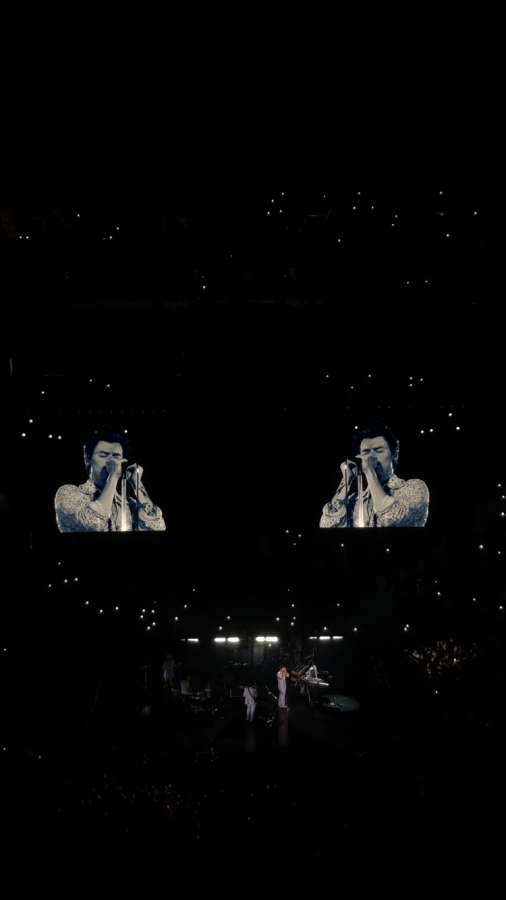 Styles performing Sign Of The Times, the first song he released as a solo artist.