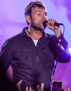 Gorillaz lead vocalist, Damon Albarn, performing at Roskilde Festival in 2018.