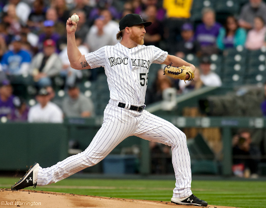 Starter Jon Gray pitching for his former club, the Colorado Rockies.