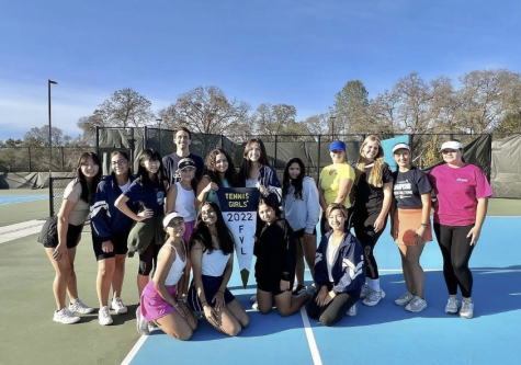 The varsity girls tennis team posing after winning FVL League Championships for the second year in a row.
