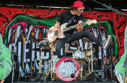 Vic Fuentes, lead singer of Pierce The Veil band. He and his band had fun performing while the audience had fun being there. 

