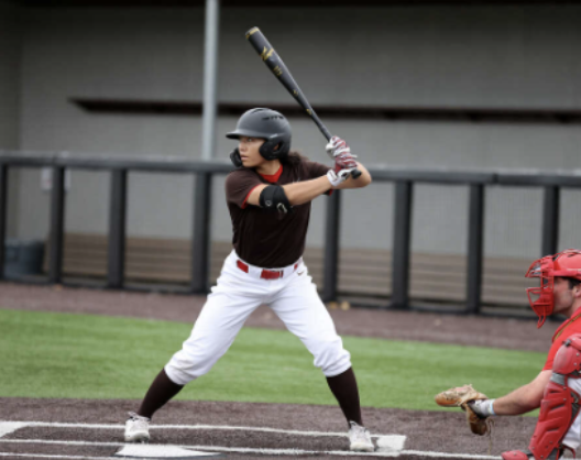 Oliva Pichardo getting ready to bat for Brown University baseball.