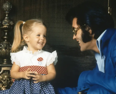 Elvis Presley with his daughter, Lisa Marie Presley.

