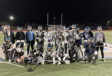 Oakmont’s 2023 boys lacrosse team in uniform on their home field. 
