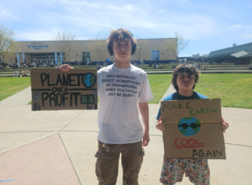 Students partaking in the Climate Awareness Photo Booth.