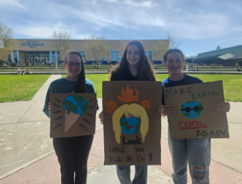 Students partaking in the Climate Awareness Photo Booth.