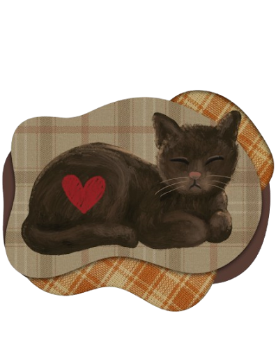 A cute cat sitting in a ‘loaf’ with a heart on its side. PC: Anna Stepanova