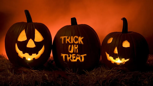 Carved Halloween pumpkins with faces and the phrase “Trick-or-Treat”. PC: Kingask, St. Andrews
