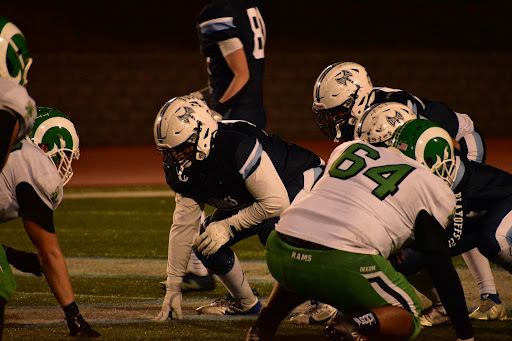 
Players get into their athletic stances as they eagerly await the play to begin. PC: Gavin White
