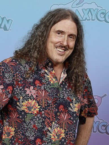 “Weird Al” Yankovic in his trademark Hawaiian shirt in 2024. PC: Super Festivals from Ft Lauderdale, CA
