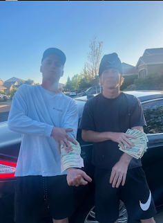 Winners KC Tibbets and Cooper Kunis showing off their prize money. PC: Lexi Stahlecker
