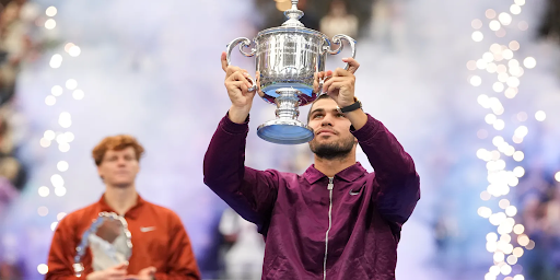 Alcaraz poses with his trophy after reclaiming the world No. 1 ranking along with his US Open victory. PC :USA Today
