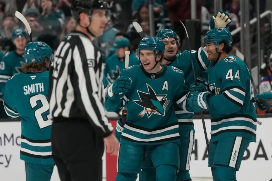 Will Smith (left), Macklin Celebrini (center), Kiefer Sherwood (right), and Dmitri Orlov (back) celebrating after a Sharks goal against Edmonton on 2/28/26. PC: Sports Radio Service
